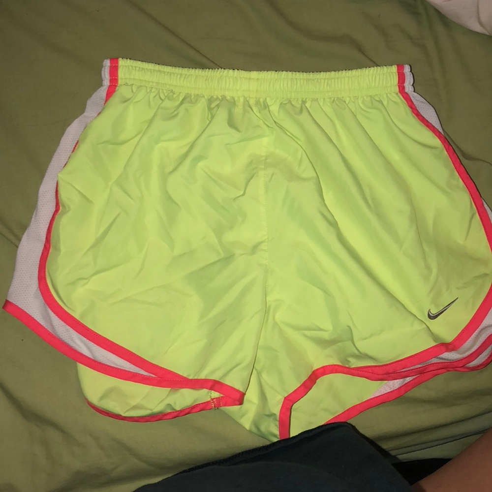 Yellow and pink nike shorts